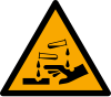 Signal ISO 7010 W023: Danger : substance corrosive